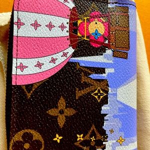 Authentic Louis Vuitton Zippy coin purse Christmas animation new with tags